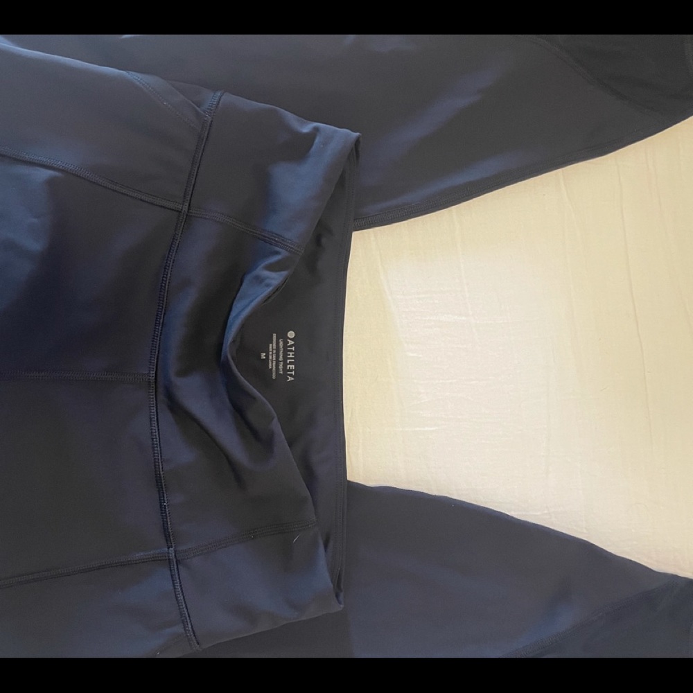 Atleta black leggings with pockets and back zíper